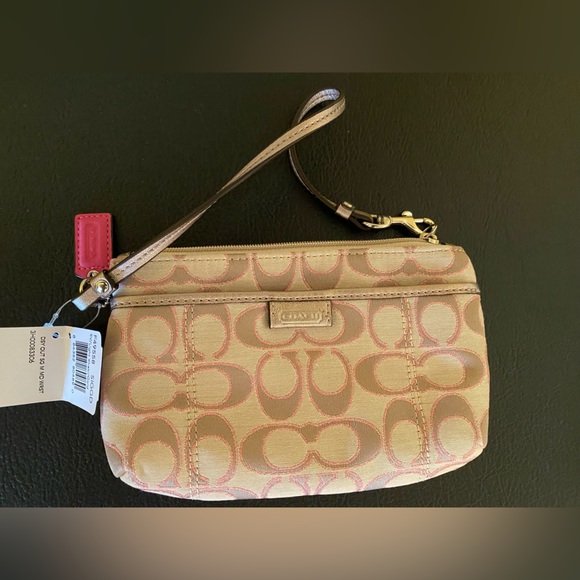 Coach Handbags - ❌❌ SOLD ❌❌ Coach light khaki and gold Wristlet NWT never worn, tag attached
